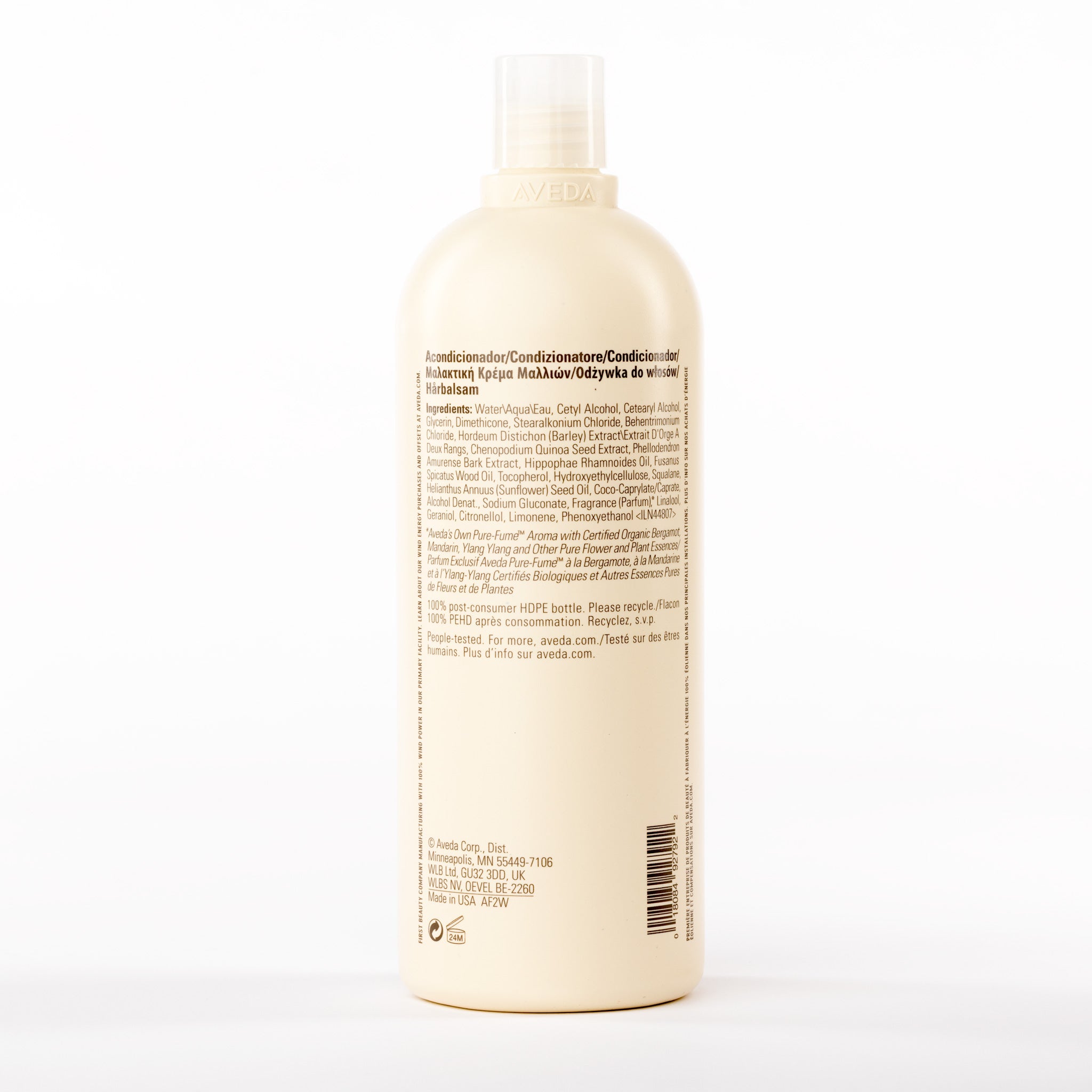 Bottle of Aveda Damage Remedy conditioner conditioner with text on a white background