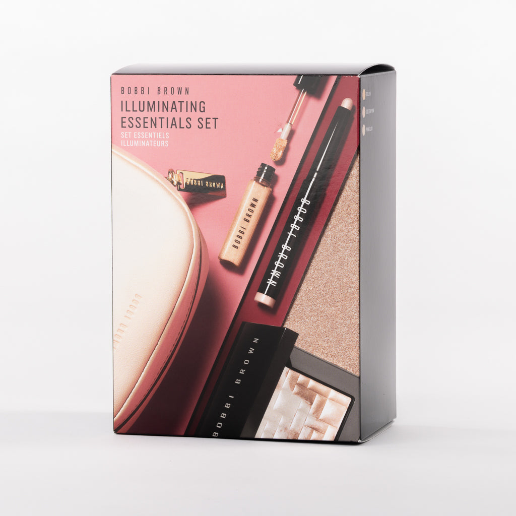 Bobbi Brown Illuminating Essentials Set contents laid out showing all four products
