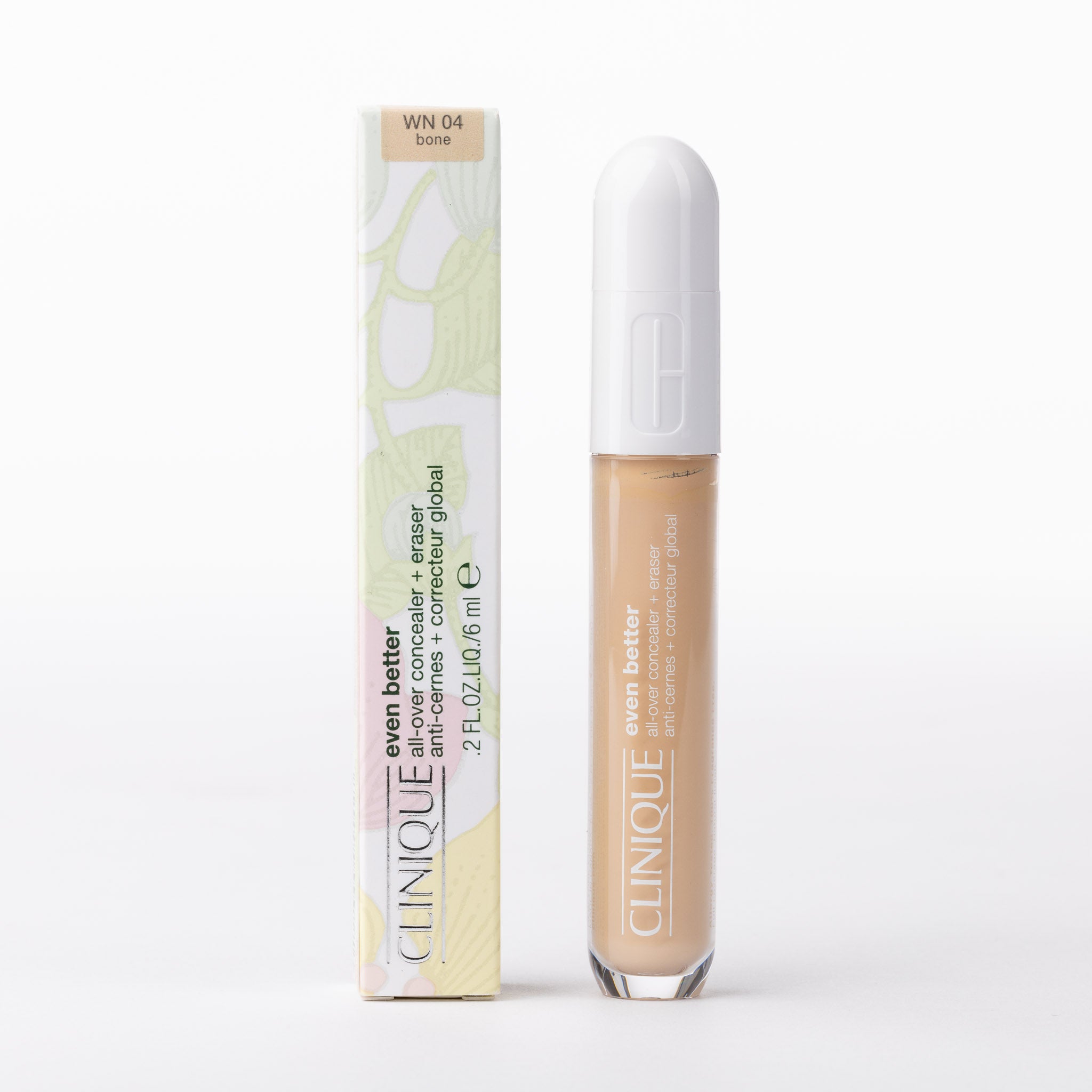 Clinique Even Better All-Over Concealer + Eraser, WN 04 Bone. Light beige liquid in sleek glass tube & patterned box.