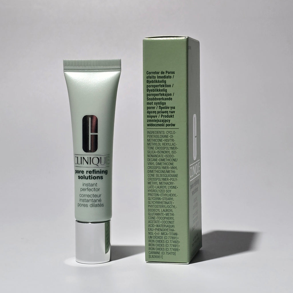 Clinique skincare product with packaging on a gray background