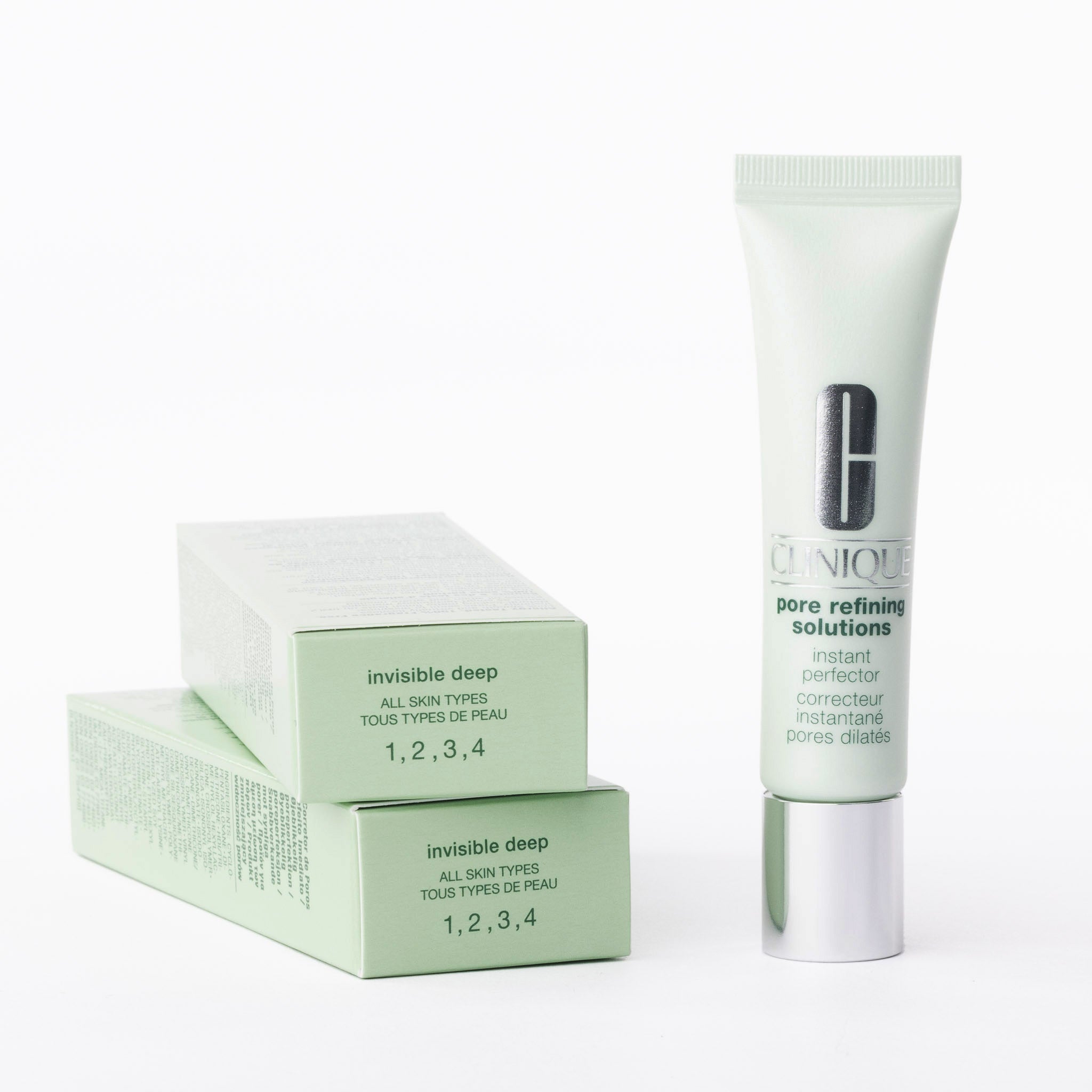 Clinique skincare product and packaging on a white background