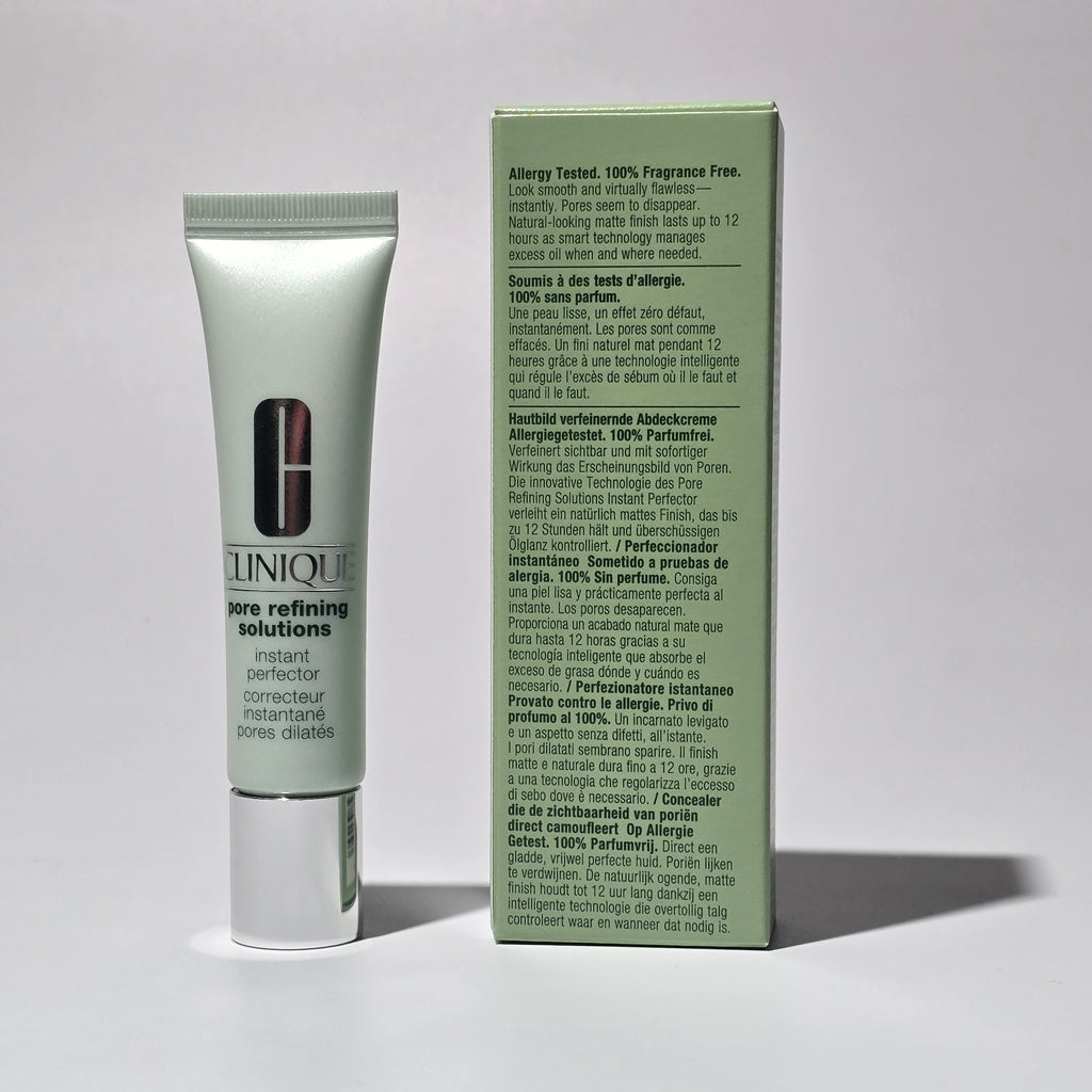 Clinique skincare product tube and packaging on a gray background