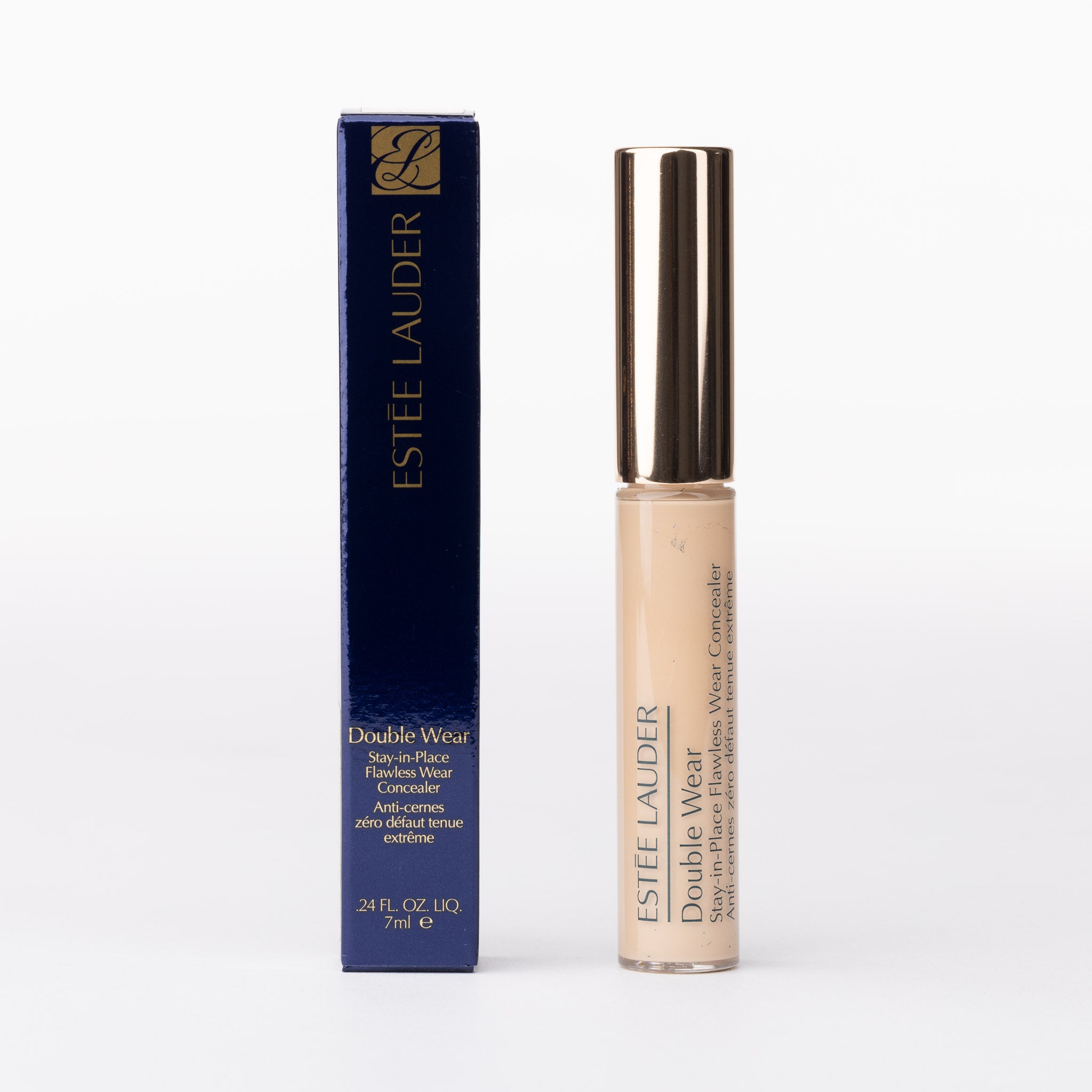 Estée Lauder Double Wear Flawless Concealer. Blue box & gold-capped, light beige liquid tube.