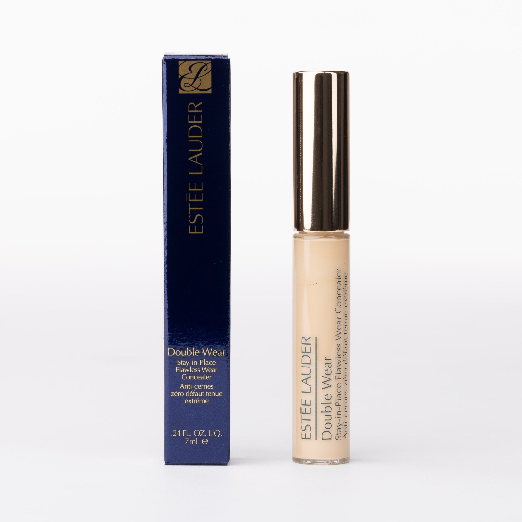 Estée Lauder Double Wear Stay-in-Place Flawless Wear Concealer, light beige liquid, navy box, gold cap.