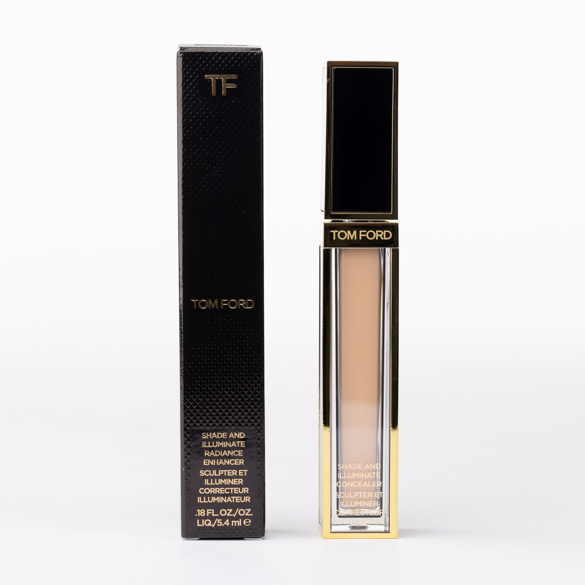 Tom Ford Shade & Illuminate Concealer. Luxurious beige liquid in a gold & black tube & matching textured box.