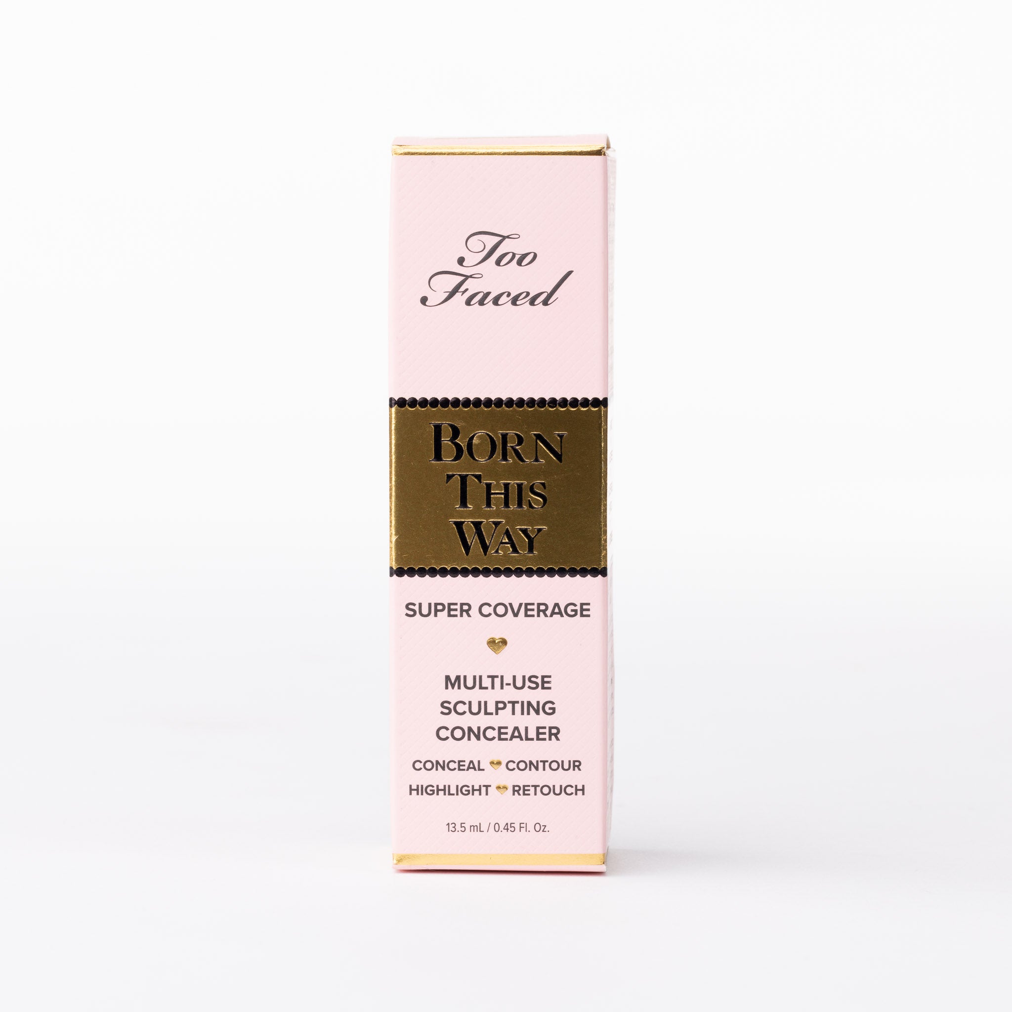 Too Faced Born This Way Super Coverage Multi-Use Sculpting Concealer in luxurious pink & gold packaging.