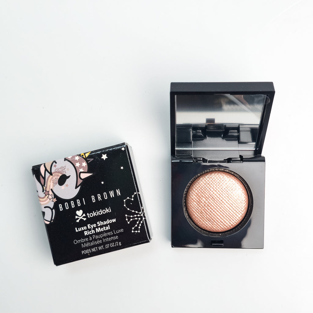 Limited edition Bobbi Brown x tokidoki metallic eyeshadow in Sunstone shade front view
