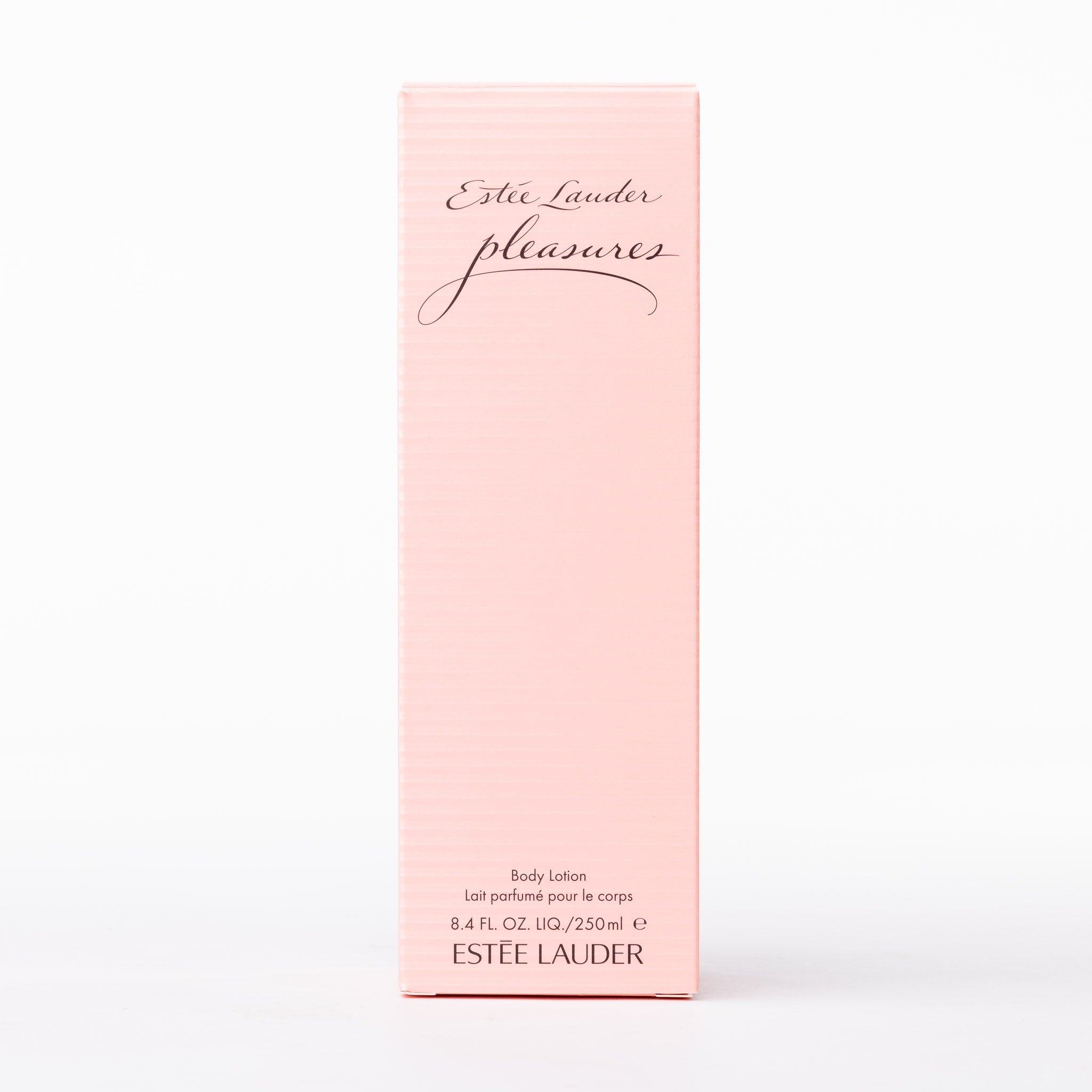 Estée Lauder Pleasures perfumed body lotion in an elegant pastel pink box, 250ml size, for luxury skincare.