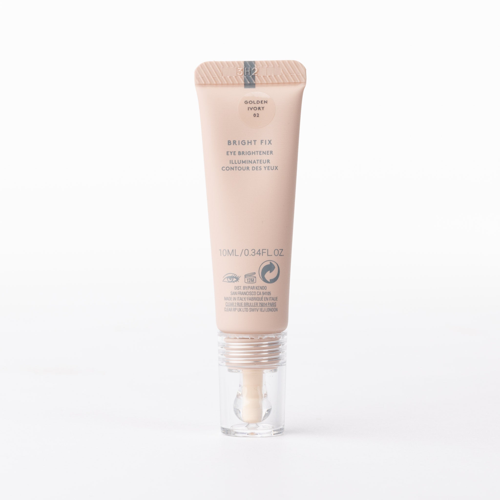 Bright Fix Golden Ivory 02 Eye Brightener. Luxury peach-nude tube with precise applicator.