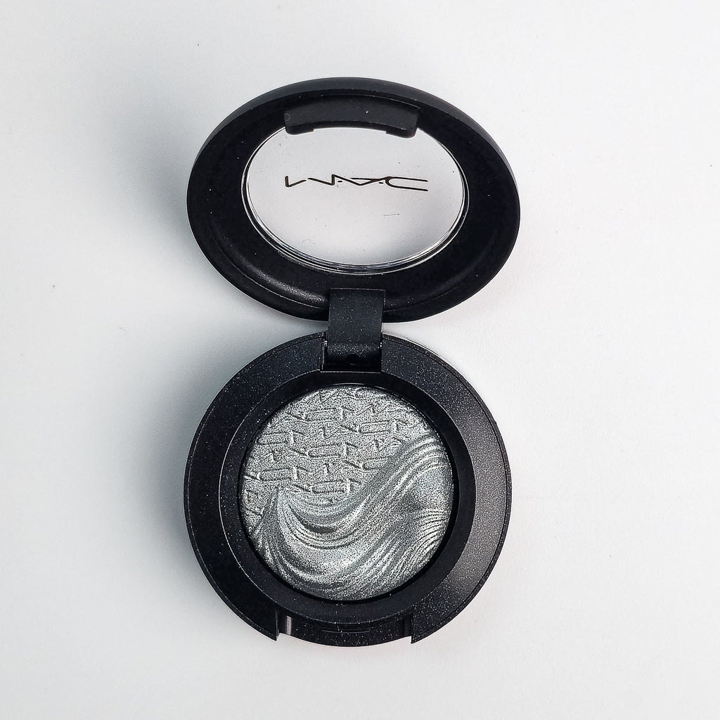 MAC Extra Dimension Eye Shadow in Evening Grey – cool-toned charcoal shimmer