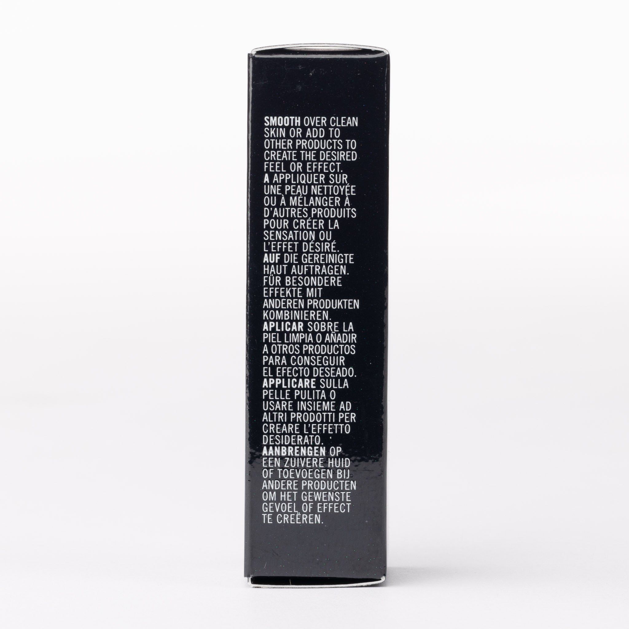 Black beauty product box with multi-language instructions to smooth on skin for a desired feel or effect.