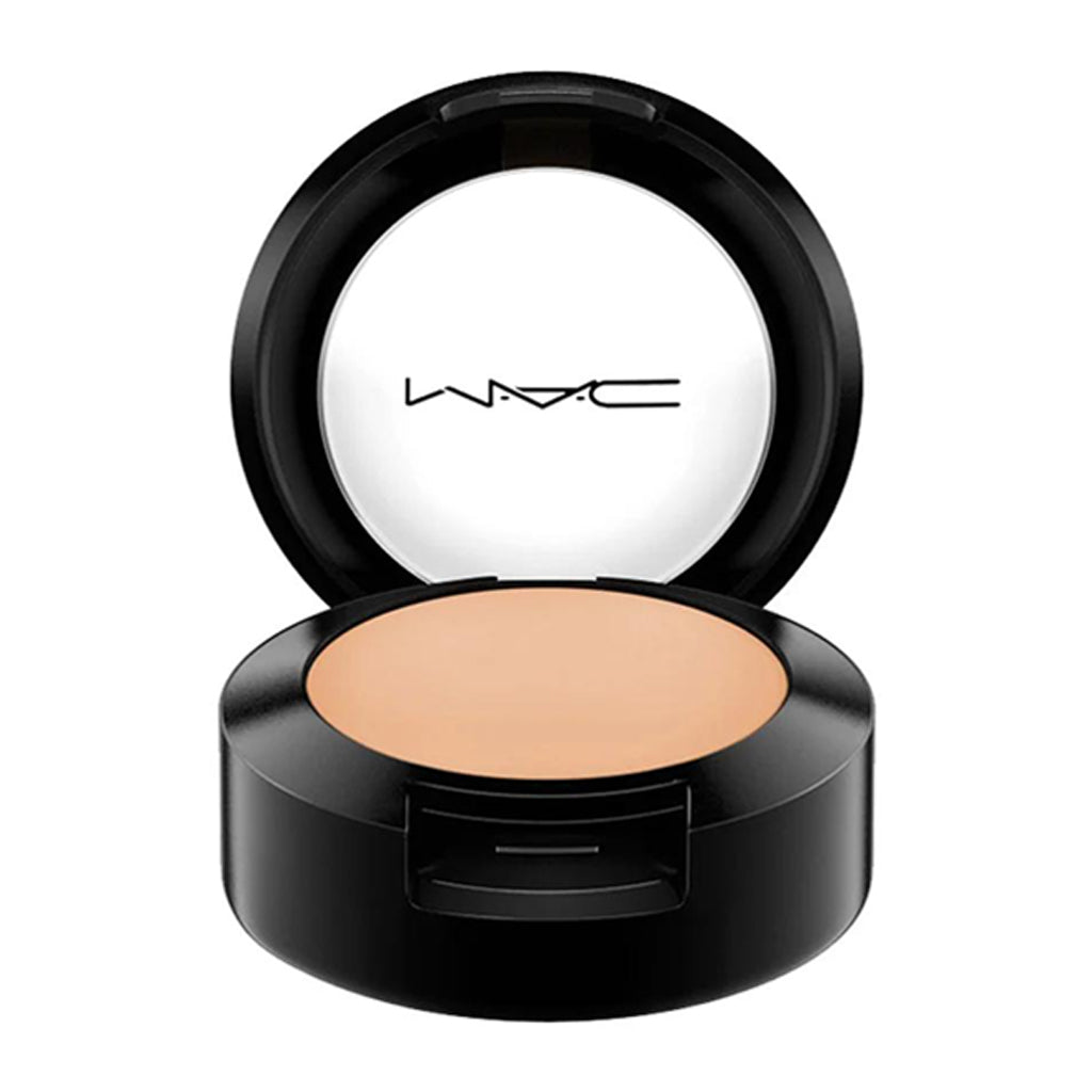 MAC Studio Finish Concealer SPF 35 in shade NW25, 7g compact opened to show product inside.