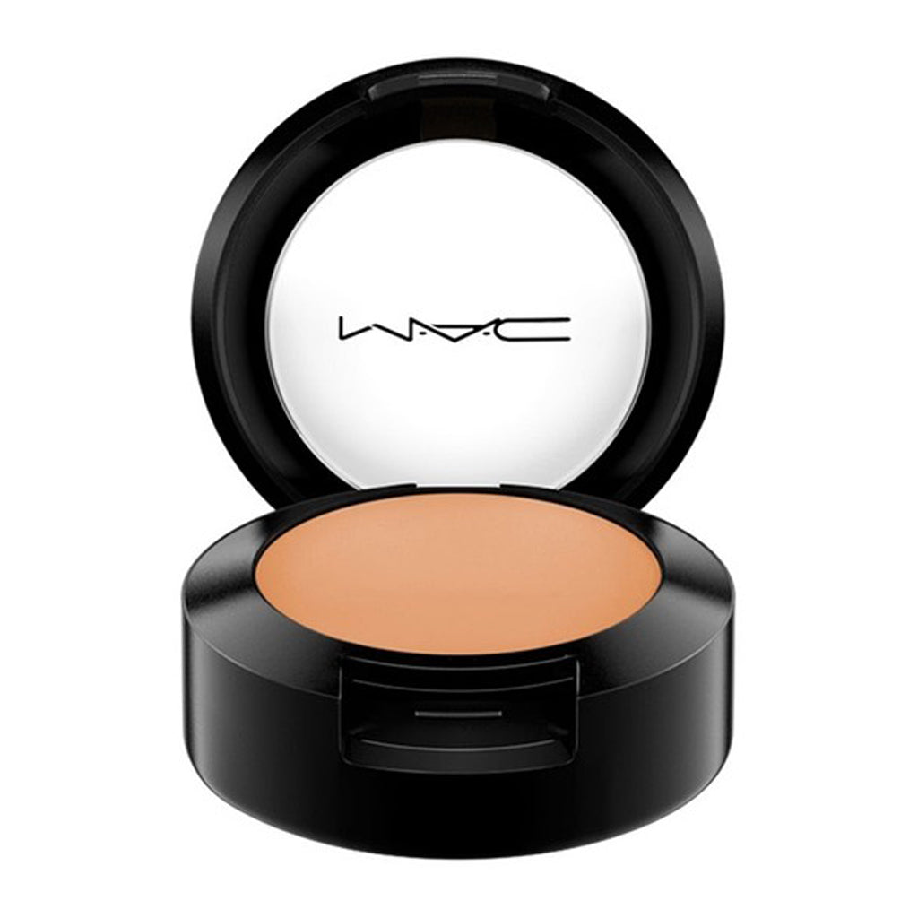 MAC Studio Finish Concealer SPF 35 in shade NW40, 7g compact opened to show product inside.