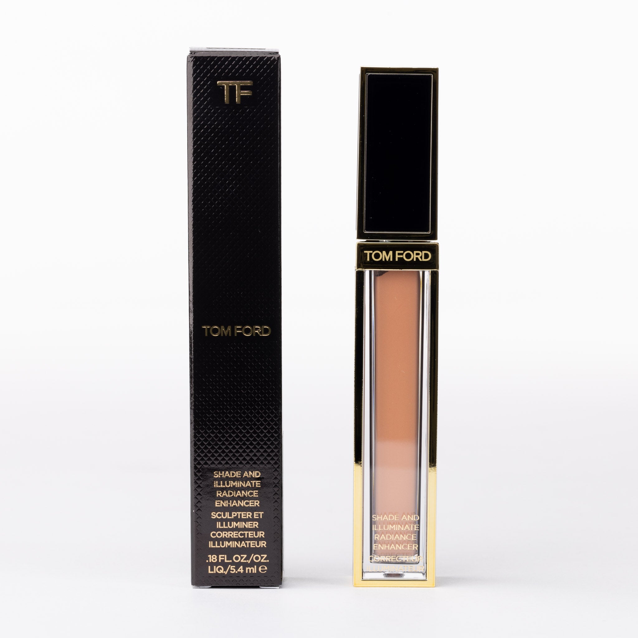 Tom Ford Shade & Illuminate Radiance Enhancer, bronze liquid in luxurious black & gold packaging.