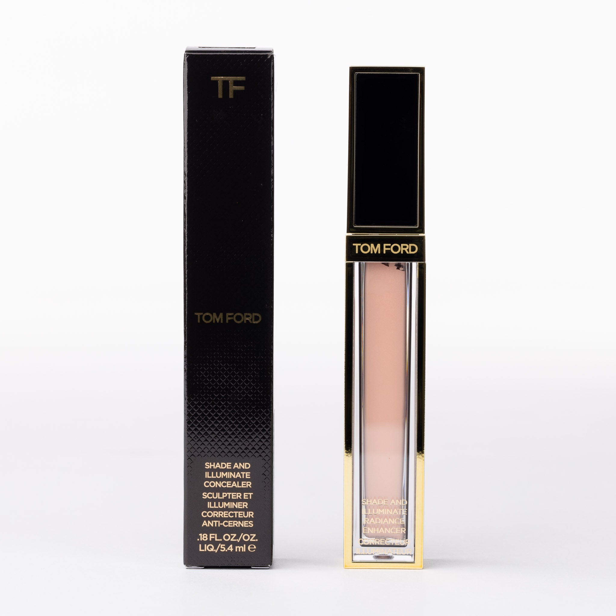 Tom Ford Shade and Illuminate Concealer & Radiance Enhancer. Black & gold tube, light peachy liquid.