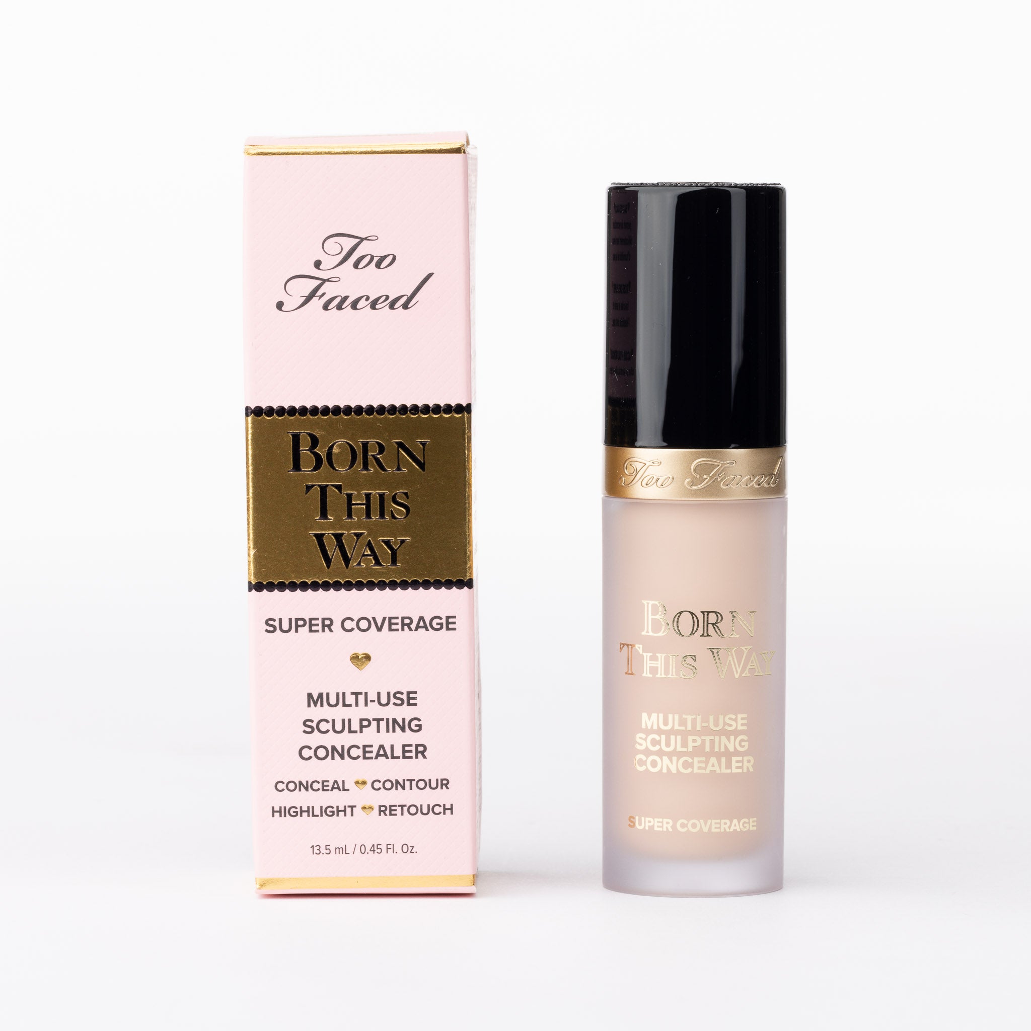Too Faced Born This Way Super Coverage Multi-Use Sculpting Concealer, fair shade liquid in elegant pink & gold packaging.