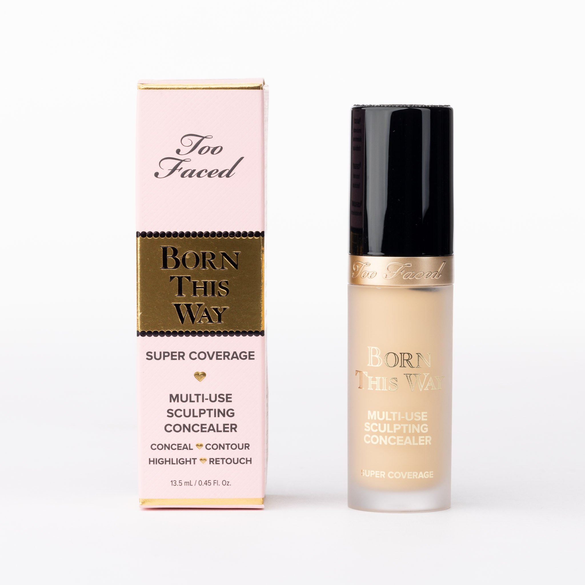 Too Faced Born This Way Super Coverage Multi-Use Sculpting Concealer. Pale beige liquid in frosted bottle with pink/gold box.